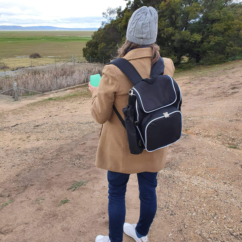 Picnic Backpack - A model dressed in winter clothing showing the picnic backpack