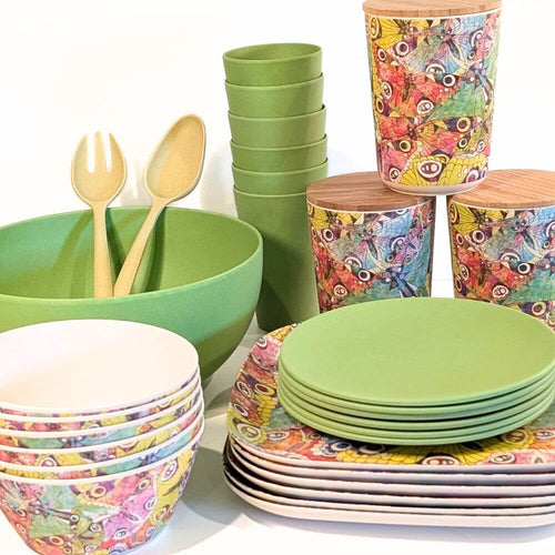 Bamboo Tableware - A value packed bundle of plates cups, bowls, salad bowl and canisters.  All piled up.  The colour combination is the Flutter pattern (think butterflies) and parakeet green.  It's a fun and vibrant colour combination