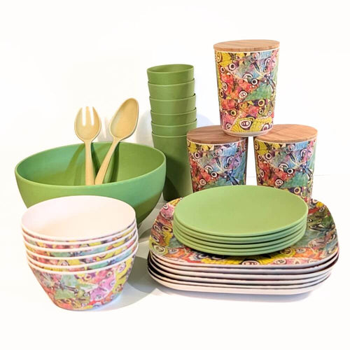 Bamboo Tableware - A value packed bundle of plates cups, bowls, salad bowl and canisters.  All piled up.  The colour combination is the Flutter pattern (think butterflies) and parakeet green.  It's a fun and vibrant colour combination