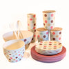 Bamboo Tableware - A value packed bundle of plates cups, bowls, salad bowl and canisters.  All piled up.  The colour combination is the Polka Dot pattern (think Retro Style) and Raspberry.  It's a fun and happy colour combination